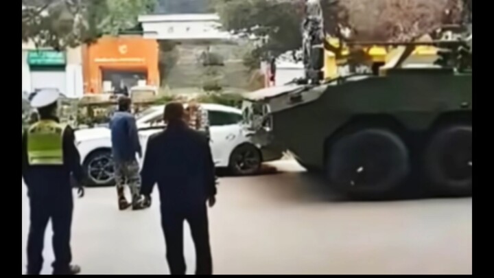 What should you do if a military vehicle and a private car collide?