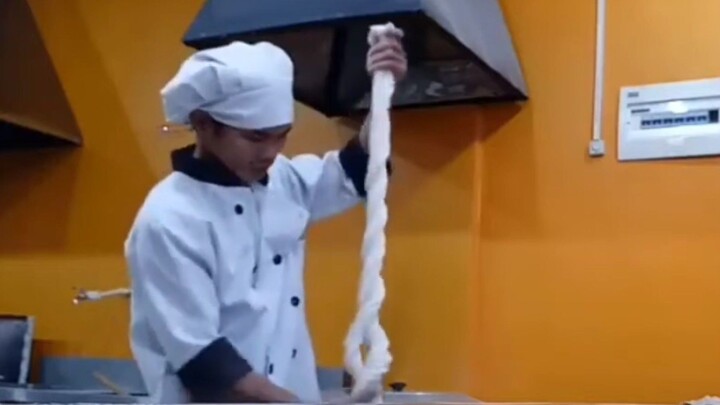 making fresh noodles..