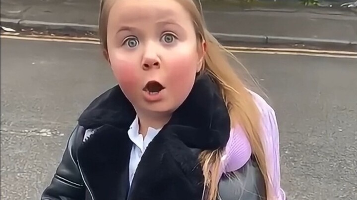 The little sister walks to school, complaining that she’s almost worn out!