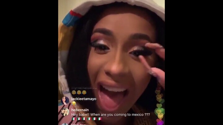 Cardi B teaches card-style dining etiquette, complete with an oyster-eating vlog
