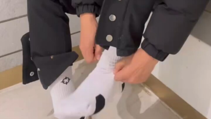 Long time no see—sports bro changing his smelly socks...