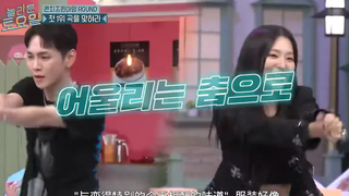 Key & Kang Seok-ki perform the "Ice Cream Cake" dance by Red Velvet, dressed in all black