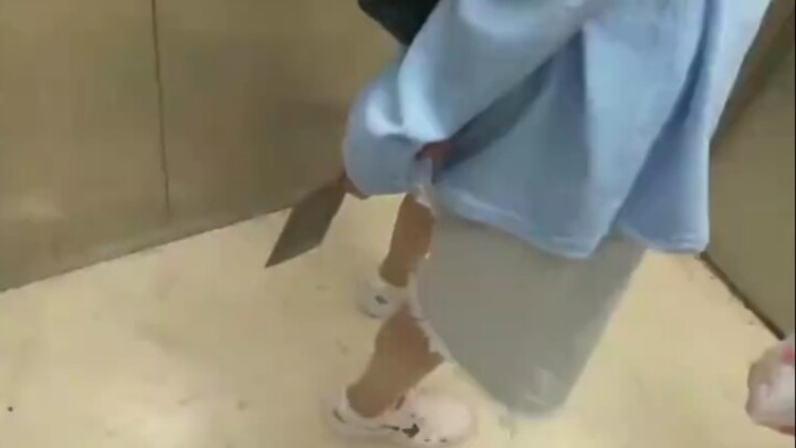 Contemporary female college students hardcore riding in the elevator