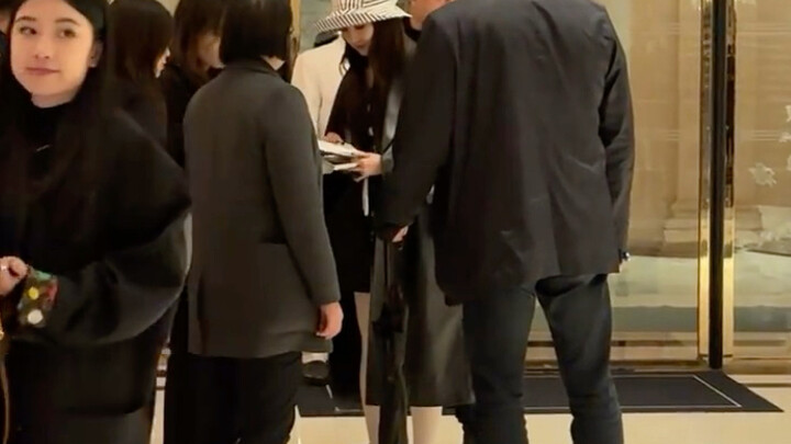 Liu Yifei in white silk stockings at Paris Fashion Week