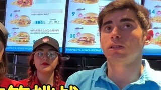 Three foreigners and a burger