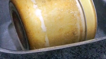 Awkward—washing dishes and ending up with a Magdeburg hemisphere, the two pots stuck together!