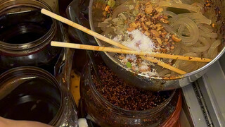 Sour and Spicy Rice Noodle Stall on a Chongqing Sidewalk