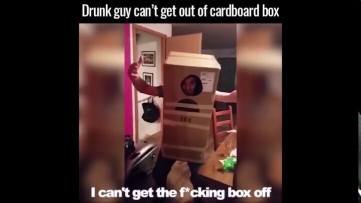 DRUNK GUY GETS STUCK IN BOX