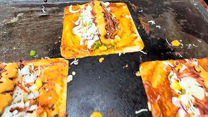 Indian shawarma on a hot griddle— the owner emphasizes healthy ingredients.