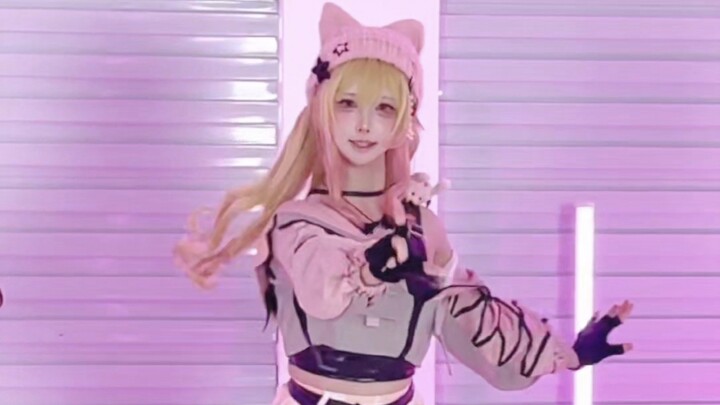 The yellow-haired one from the pink-hair group has jumped! Cat loving!