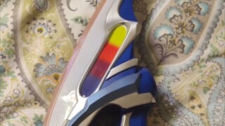 My brother has a Beyond X head logo. Can anyone help me check if it is a genuine Bandai product?