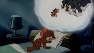 Jerry dreams of being chased by Tom Cat