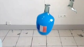 Glass bottles collide and shatter—pressure-release moment!