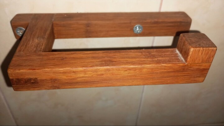 Amir Uzan - 16. Wooden toilet paper holder.
