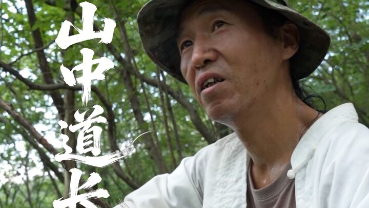 What does a Taoist priest who’s carried a gun all day look like?