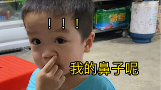Pretend to take off the baby's nose, he believed it!