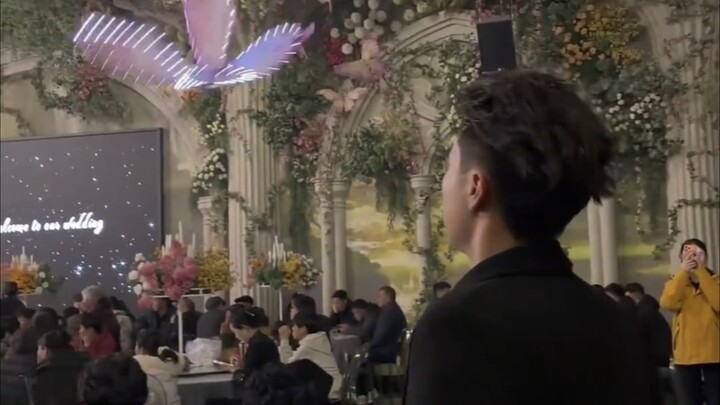 A lifelike bionic butterfly makes a stunning appearance at a wedding, gracefully circling the newlyw