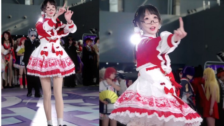 Is Little Cake dancing the otaku dance at the comic convention?