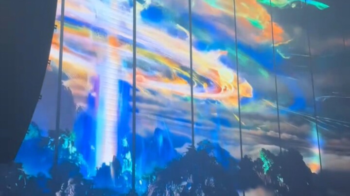 The big screen at the bar is showing "Immortal Cultivation Chronicles"—Han Li's Infant Formation! So