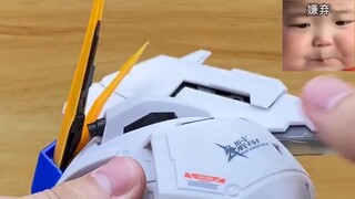 What tools do you use to clean the dust and polish on the Gundam?