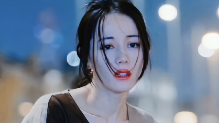 She stood there as if she were about to shatter.