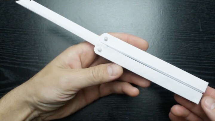 Make a foldable butterfly knife out of some white paper!