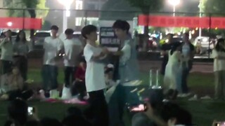 There's always a dancer on the playground, but I only noticed these two male college students.