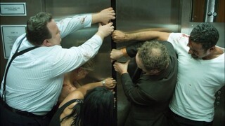 Nine Strangers Stuck In An Elevator, One Of Them Carries A Bomb