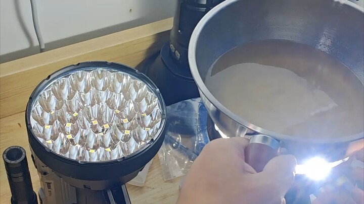 Still cooking noodles with a flashlight