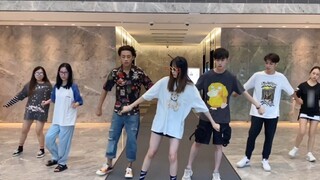 Organizing colleagues to dance and drink in public during work!