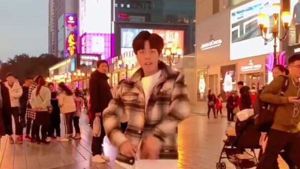 Dancing the super popular whistle dance on the street, which moment attracted you?