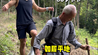 Putting an exoskeleton suit on an 80-year-old elderly man
