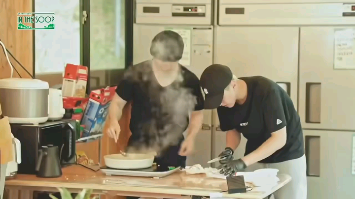 Two robbers broke into the kitchen.