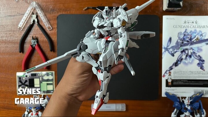 تجربة غامرة لتجميع النماذج: وان باند HG 1/144 ميركوري ويتشر كاليبان جاندام أوريجين جاندام