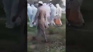 Family members of the dead body weeping over the corona virus infected person.