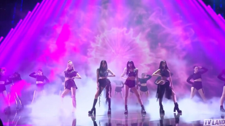 It's Blackpink, but with the "Vanishing Backup Dancers" trick