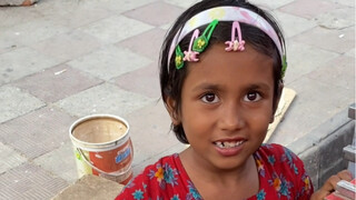 Little girl selling milk tea