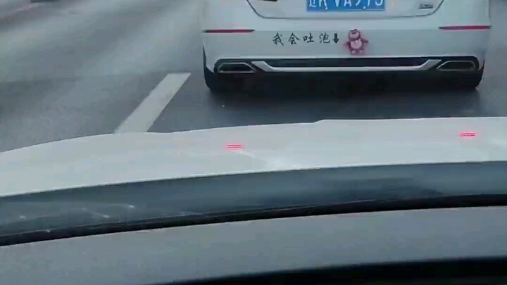 A “I Can Blow Bubbles” sticker was put on the rear of a small car, and after the car behind honked t