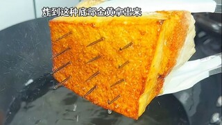 Boiled meat is filled with toothpicks and fried in a pan. Isn't this Meicaikourou? I also learned it