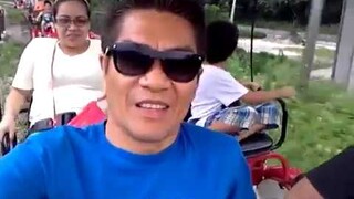 Family riding railbike