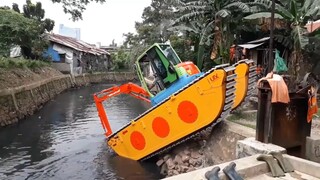 Excavator down the river 😂😂