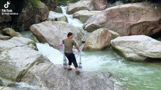 catching fish by net