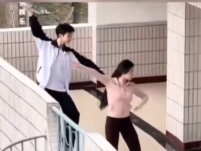 A boy was dancing in the hallway during class break. When the teacher came upstairs and saw him, the