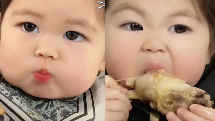 Baby loves the greens Grandpa and Grandma grow—scooping them up with their little mouth like a tiny 