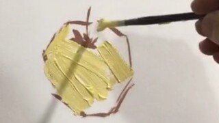 Art student paints varying thickness, color still life with apples
