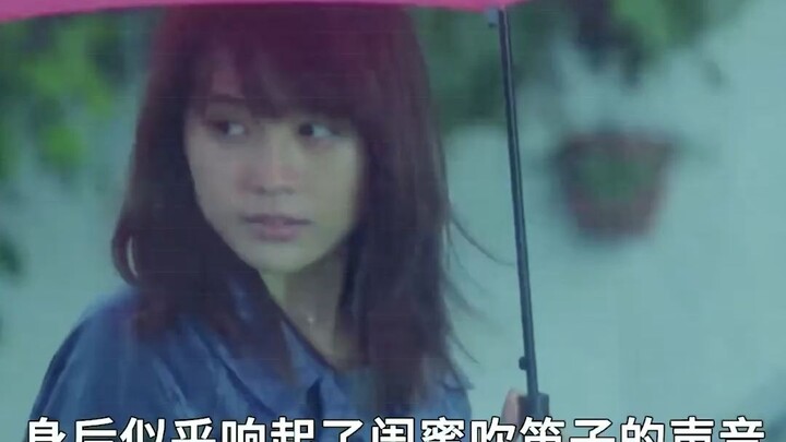 A golden rain started to fall as the girl was just taking a stroll.