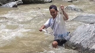 fishing in Nepal with cast-net.