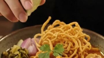 AI man vs Khao Soi chicken