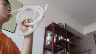 Play 'Socialism Is Great' With A Washing Machine Drain Hose