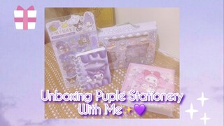 [unboxing new purple stationery]